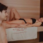 Couple relaxing at Sunset Hotel luxury spa, enjoying a calm and tranquil ambiance.
