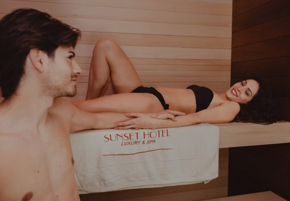 Couple relaxing at Sunset Hotel luxury spa, enjoying a calm and tranquil ambiance.