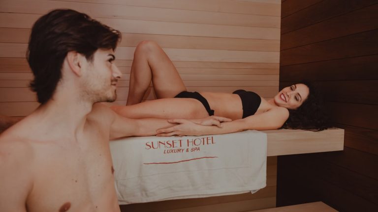 Couple relaxing at Sunset Hotel luxury spa, enjoying a calm and tranquil ambiance.